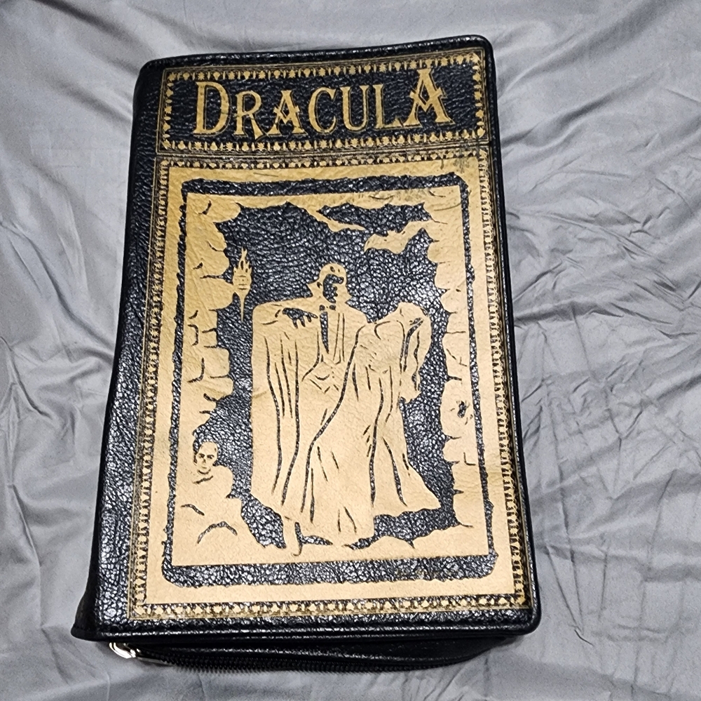 Dracula leather book purse. NWOT.  Shoulder strap.